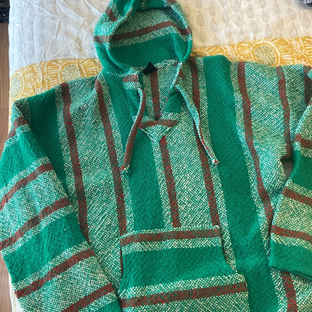 Green red and white poncho-size xl